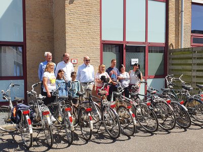 Logo voor Rotary Hillegom-Lisse maakt samen met Welzijnskwartier vluchtelingen blij met fietsen